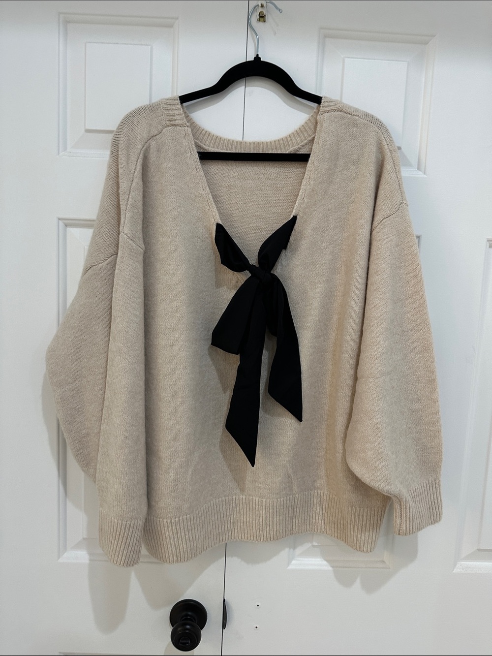 SHEIN Cream V-Neck Sweater with Black Bow